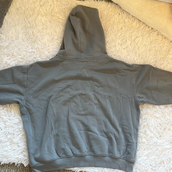 This is an H&M blue is gray hoodie in women's size medium - Picture 2 of 4